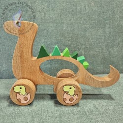 Jouet en bois à pousser dinosaure